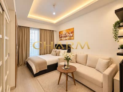 استوديو  للايجار في ميدان، دبي - Cozy Modern Studio with Warm Accents. png
