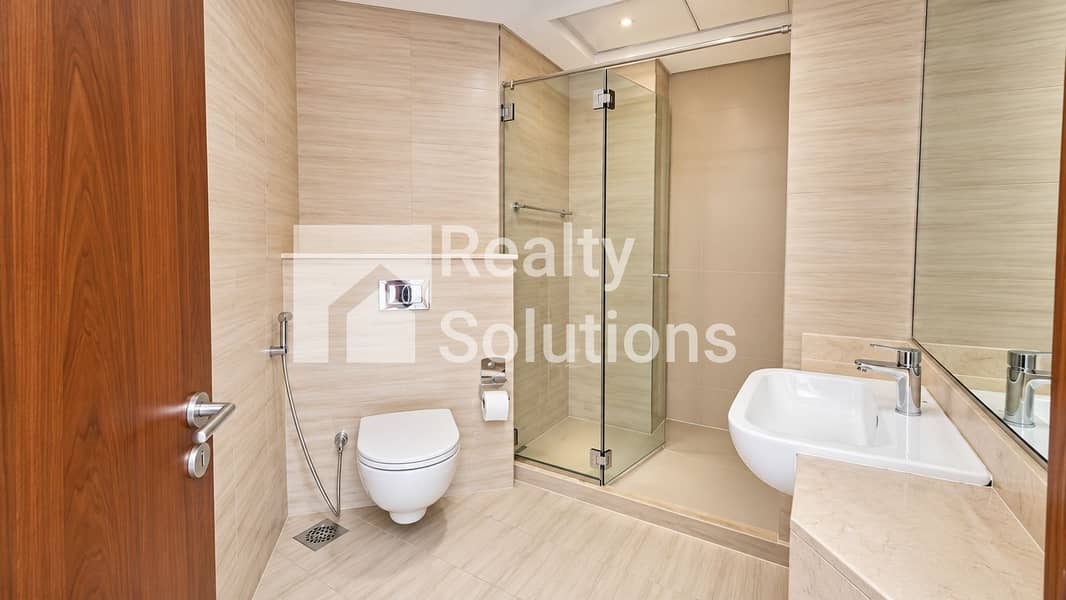 4 Modern Beige Tile Bathroom. png