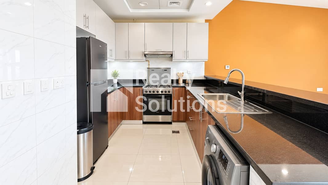 5 Modern Orange-Accent Kitchen Elegance. png