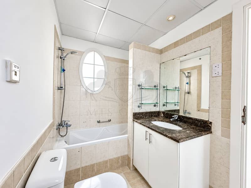 11 Bright Modern Beige Bathroom. png