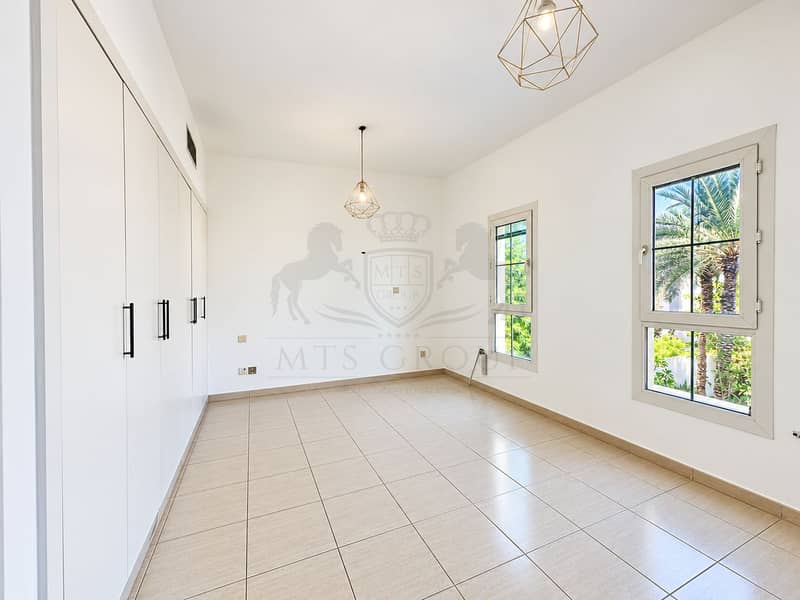 15 Minimalist Bedroom with Tropical Garden Views. png