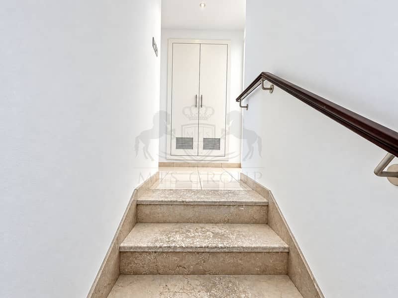 17 Minimalist Marble Stairway to White Cabinet. png