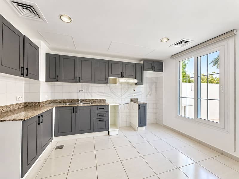 19 Modern Gray Kitchen with Garden View. png
