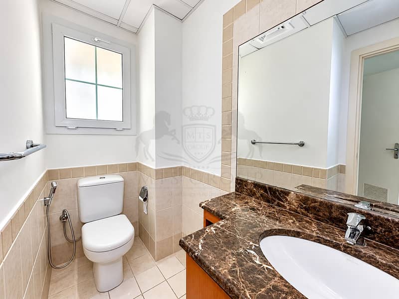 25 Modern Neutral Bathroom with Marble Vanity. png