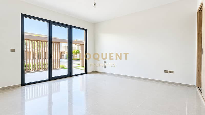 8 Bright Minimalist Room with Garden Views. png
