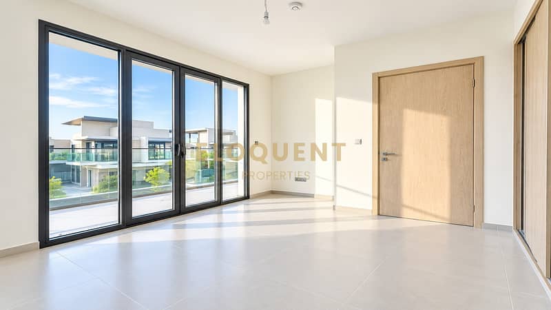 9 Bright Minimalist Room with Glass Patio Doors. png