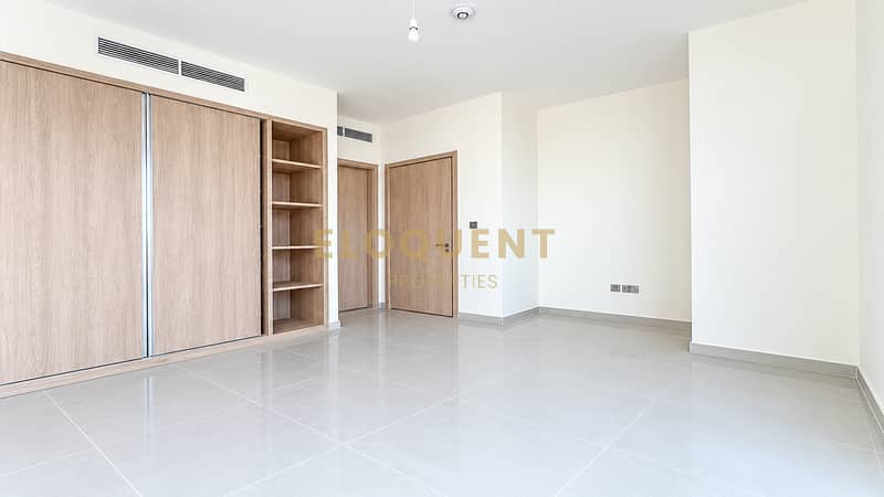 11 Minimalist Empty Room with Wood Wardrobe. png