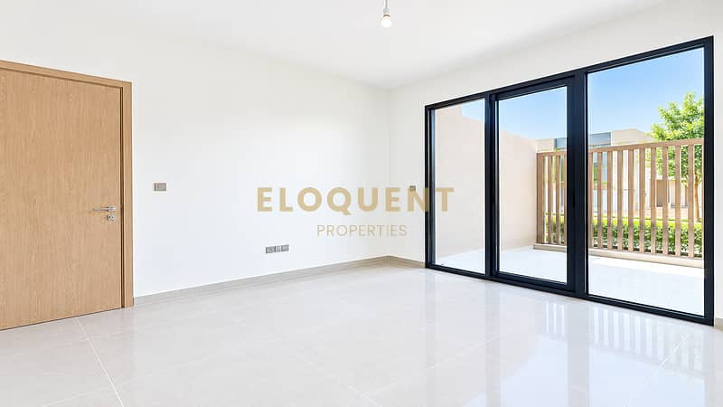 12 Bright Minimalist Room with Glass Doors. png