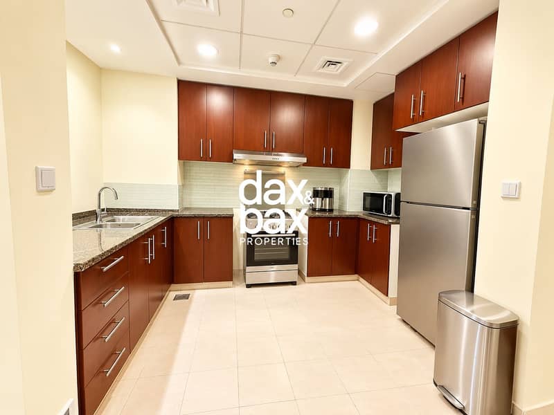 4 Pristine Warm-Toned Modern Kitchen. png
