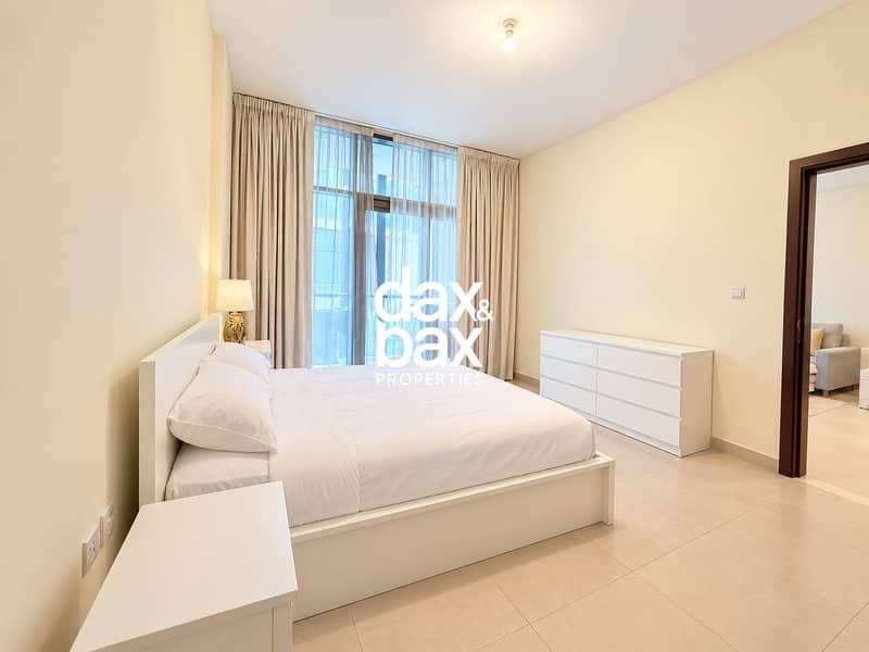 9 Minimalist Bedroom with City View. png