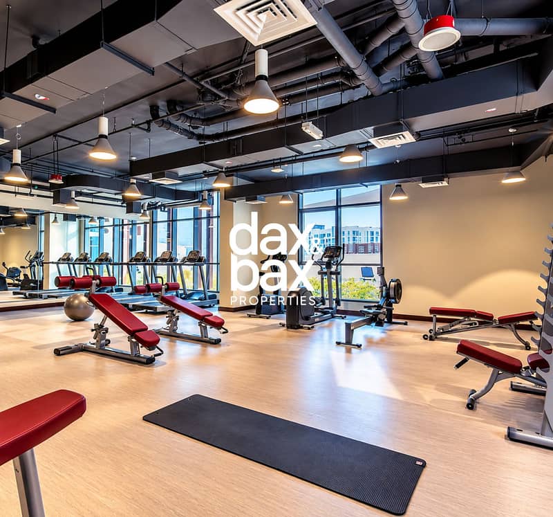 17 Bright Modern Gym with Red Benches. png