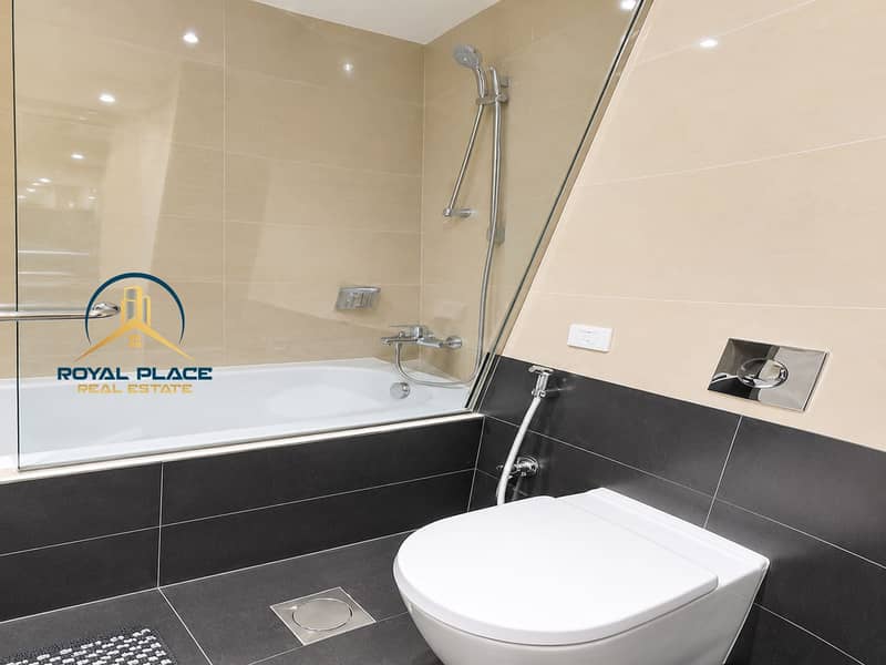 6 Bright Modern Beige and Charcoal Bathroom. png