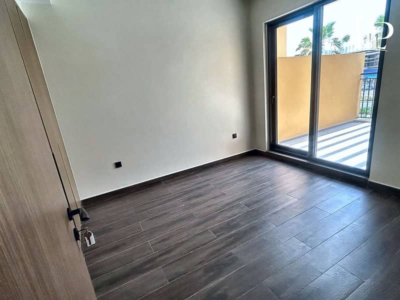 5 03_Master_Bedroom_with_Balcony. jpg