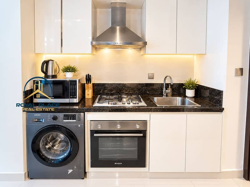 5 Modern Compact Kitchenette with Warm Lighting. png