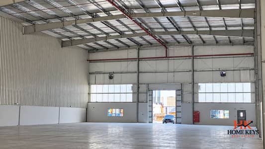 Warehouse para en Alquiler en Dubai Industrial City, Dubai - Modern Industrial Warehouse Interior. png