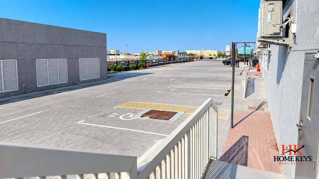 3 Sunlit Industrial Parking Lot. png