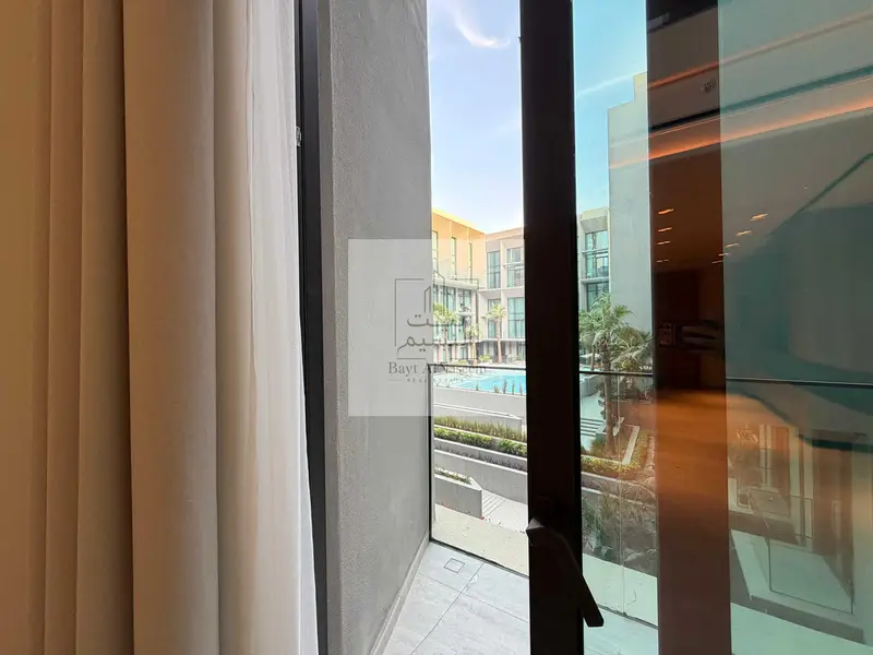 Pool View | 1BR Duplex | Fitted Kitchen