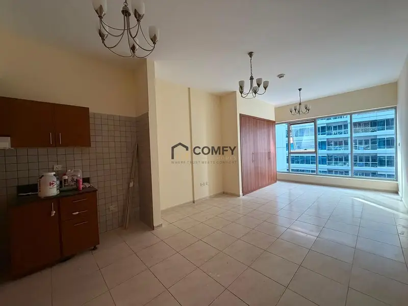 Unfurnished Studio | Skycourts Tower F | Community & Pool View