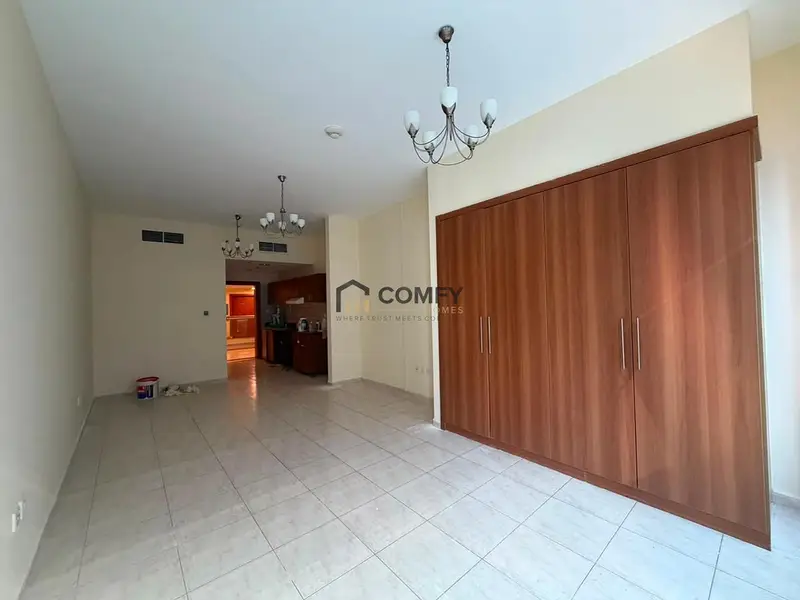 Unfurnished Studio | Skycourts Tower F | Community & Pool View
