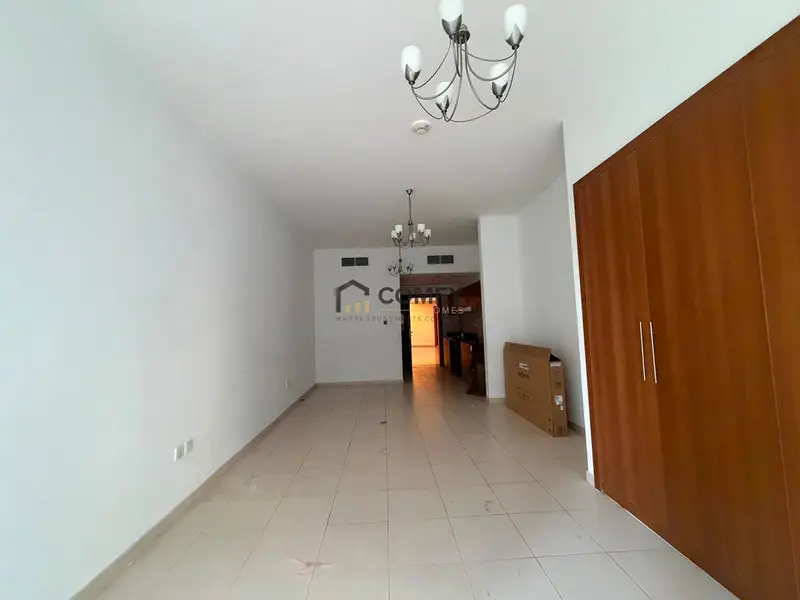 Unfurnished Studio | Skycourts Tower F | Community & Pool View