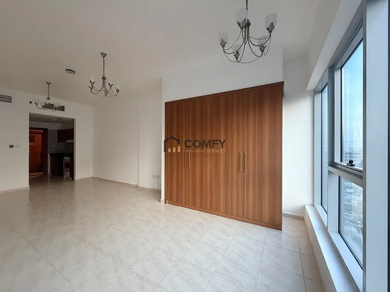 Unfurnished Studio | Skycourts Tower F | Community & Pool View