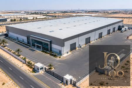Showroom para en Alquiler en Umm Dera, Umm Al Quwain - Desert Distribution Warehouse Aerial View. png