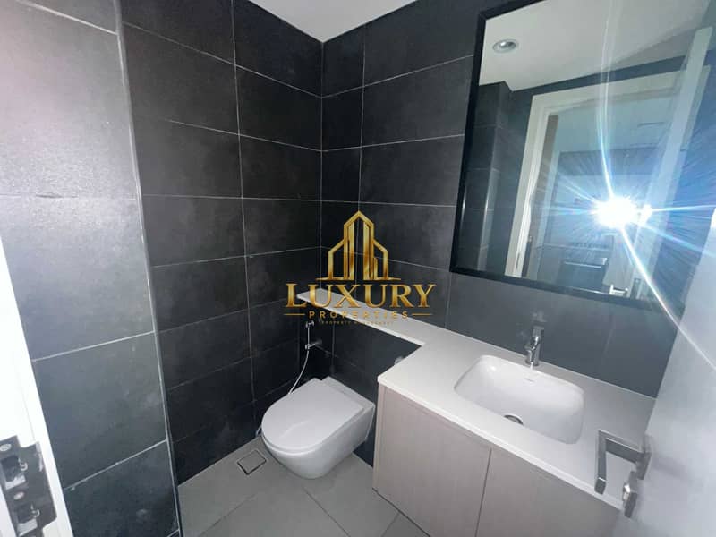 12 🔥 HOT RENTAL DEAL! 🏡 Spacious 1BHK in Aljada, Sharjah | 2 Washrooms | Only AED 49,990/Ye