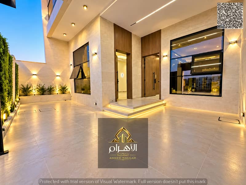 مدخل فيلا عصرية بإضاءة دافئة. jpg مدخل فيلا عصرية بإضاءة دافئة. jpg