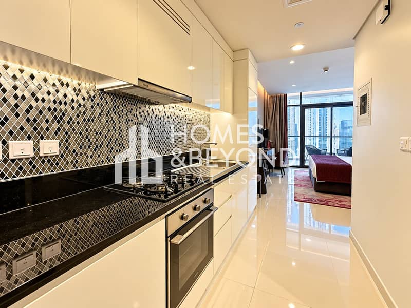 2 Modern Kitchen Corridor with Skyline View. png
