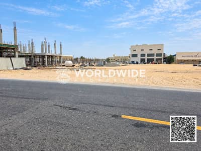 Industrial Land para en Venta en Al Bahia, Ajman - Roadside construction property view-5. png