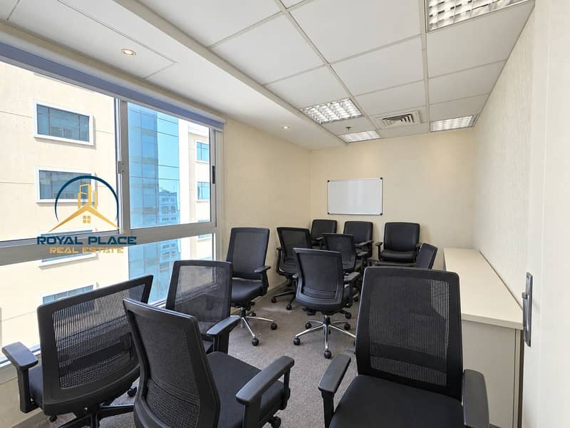 10 Naturally lit office with tidy chairs. png