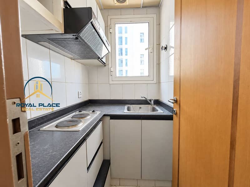 11 Bright, tidy office kitchenette. png