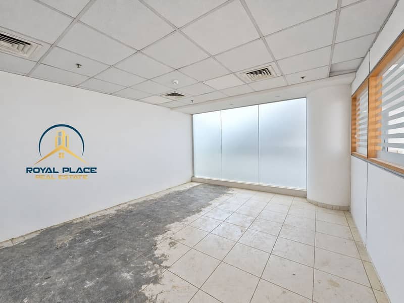 12 Clutter-free empty office interior. png
