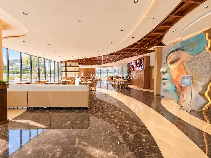 6 Curved Luxury Caf Interior with Artful Mural. png