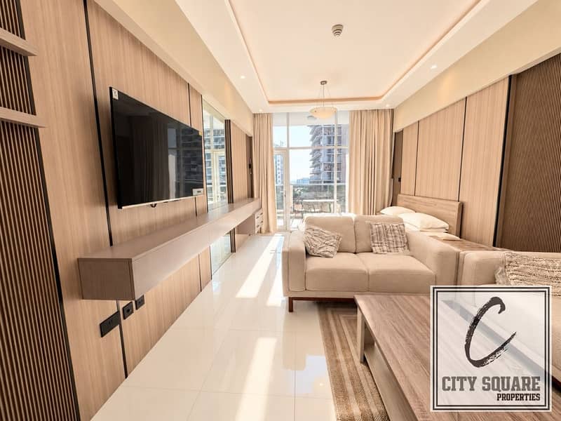 5 resize_Bright Modern Studio with City Balcony Views. jpeg
