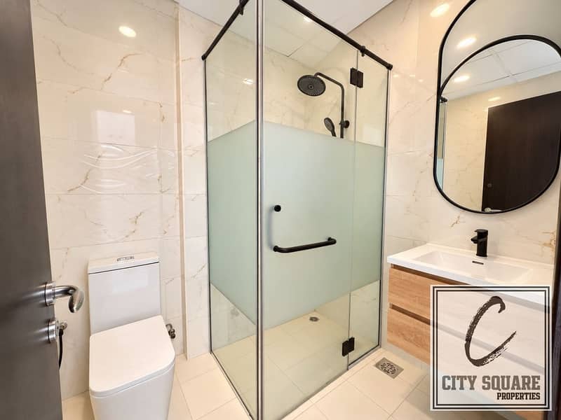 6 resize_Modern Marble Bathroom with Glass Shower. jpeg