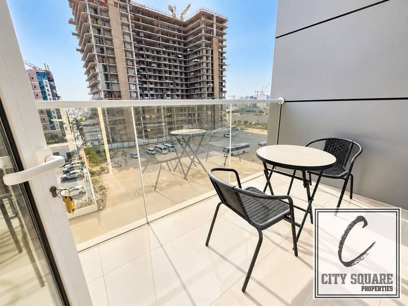 9 resize_Sunlit Balcony Overlooking Construction Cityscape. jpeg