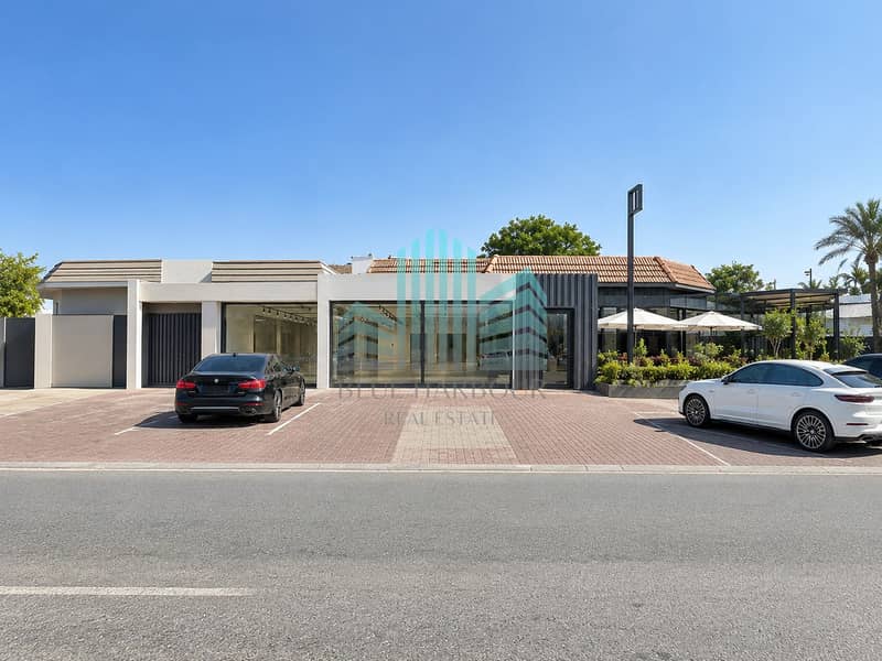 Modern Storefront in Sunlit Parking Lot. png Modern Storefront in Sunlit Parking Lot. png