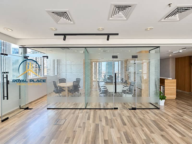 6 Bright glass-partitioned office interior. png
