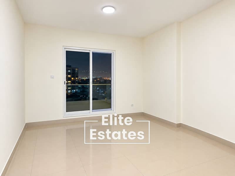 6 Minimalist Apartment with City Lights. png