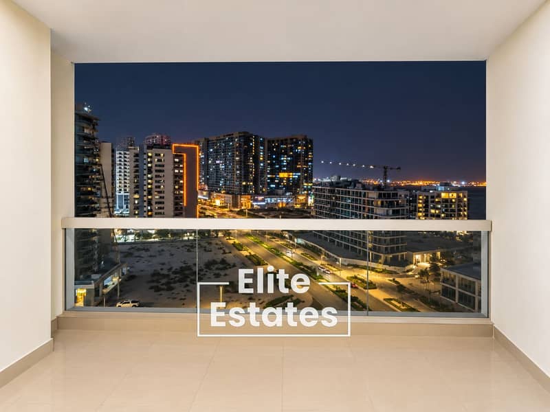 7 Night Cityscape Framed by Balcony. png