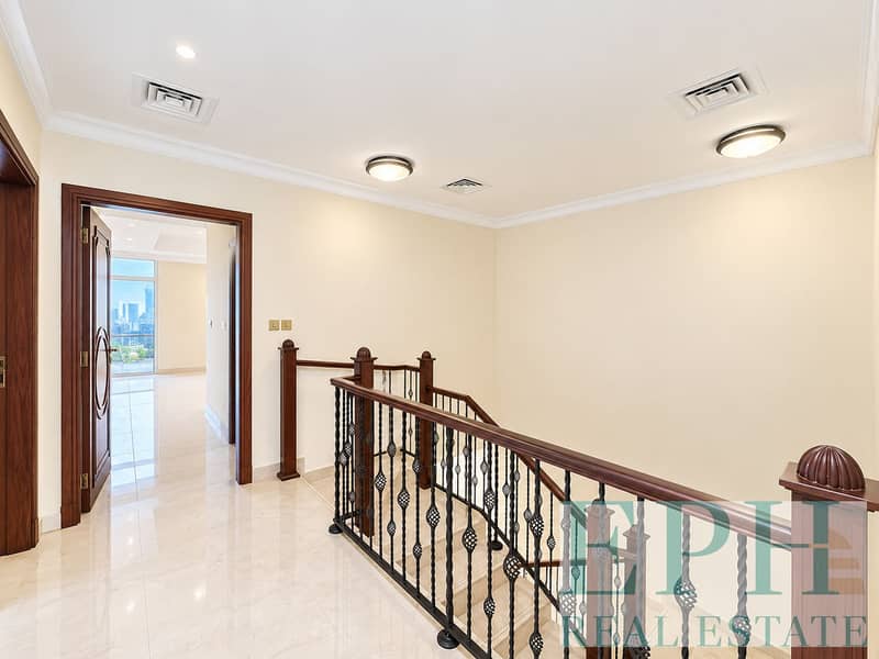 6 Elegant Marble Landing with Ornate Stair Railing. png