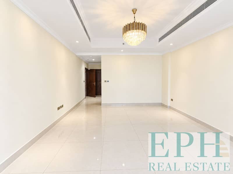 13 Bright Minimalist Room with Crystal Chandelier. png