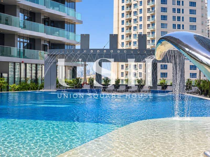 11 Luxury Resort Pool with Cascading Water Features. png