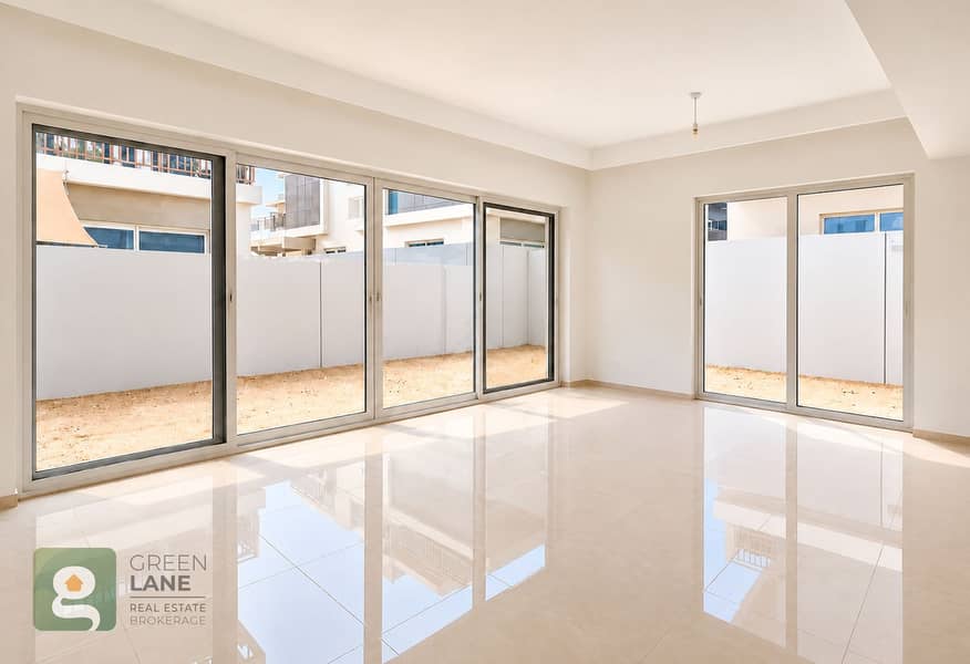 3 Bright living room with sandy garden views-2. png
