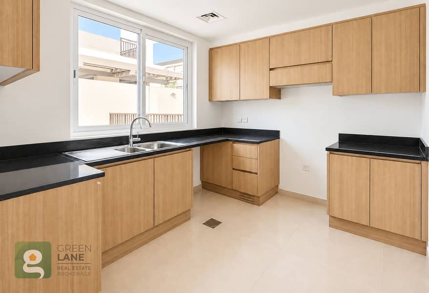 5 Warm kitchen with wood cabinets-8. png