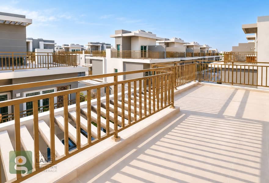 7 Sunlit rooftop terrace with gold railings-3. png