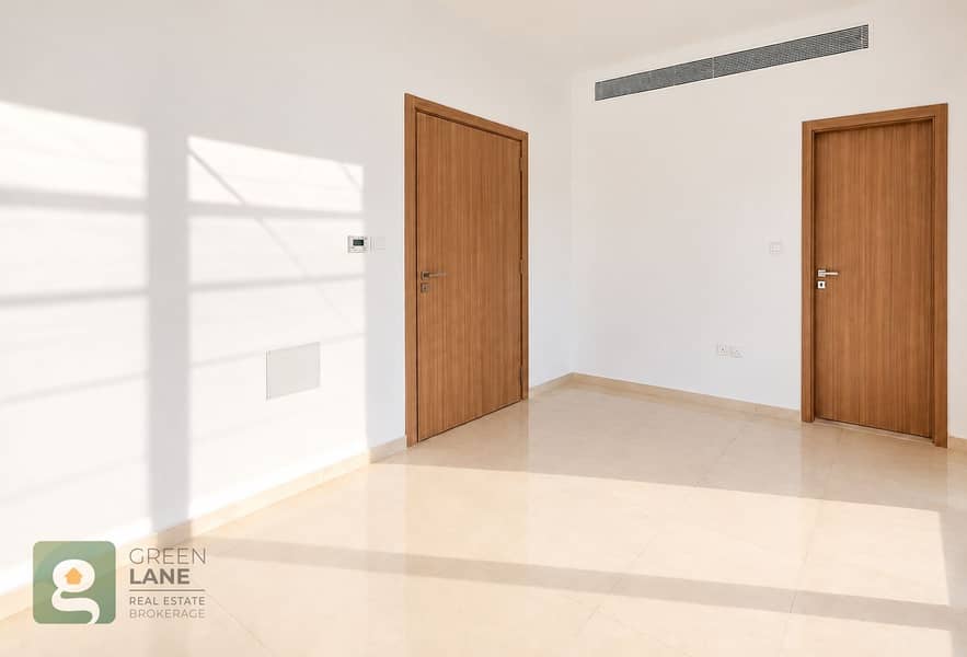 11 Sunlit room with wooden doors-11. png
