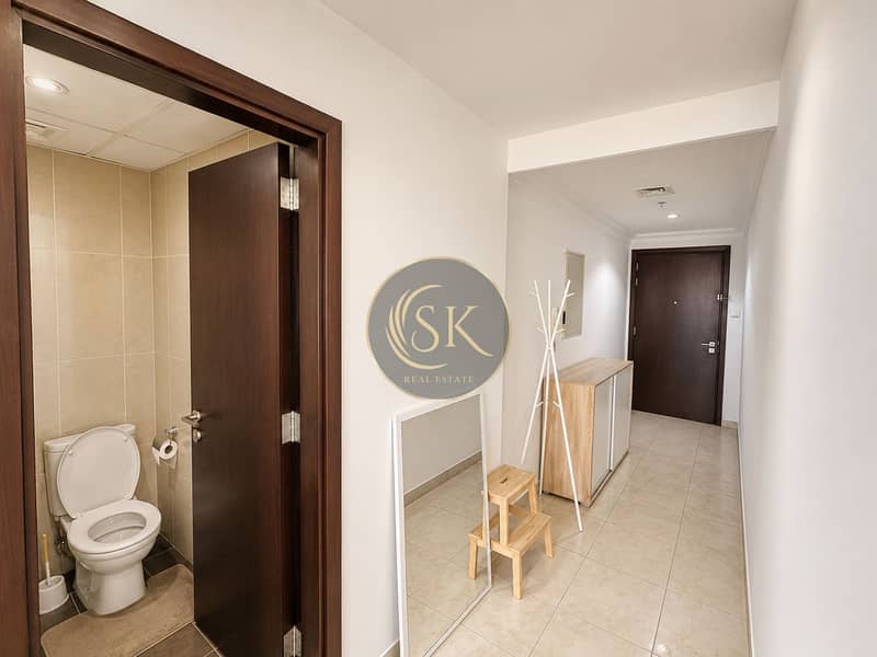 4 Modern Minimalist Hallway with Bathroom Nook. png