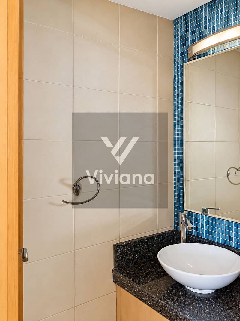 18 Modern Bathroom Vanity with Blue Mosaic Tiles. png